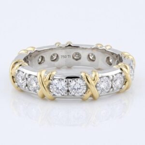 gold two-tone eternity ring with 1.6ct round moissanite all around